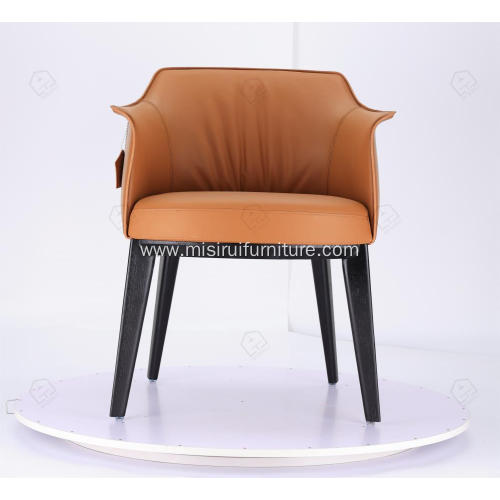 Italian minimalist orange leather single Archibald chairs